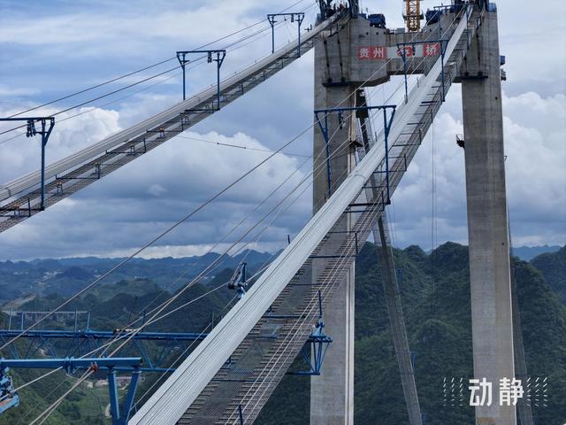 主缆架设在世界第一高桥花江峡谷大桥上完成，所用钢丝可绕赤道两圈。  第5张